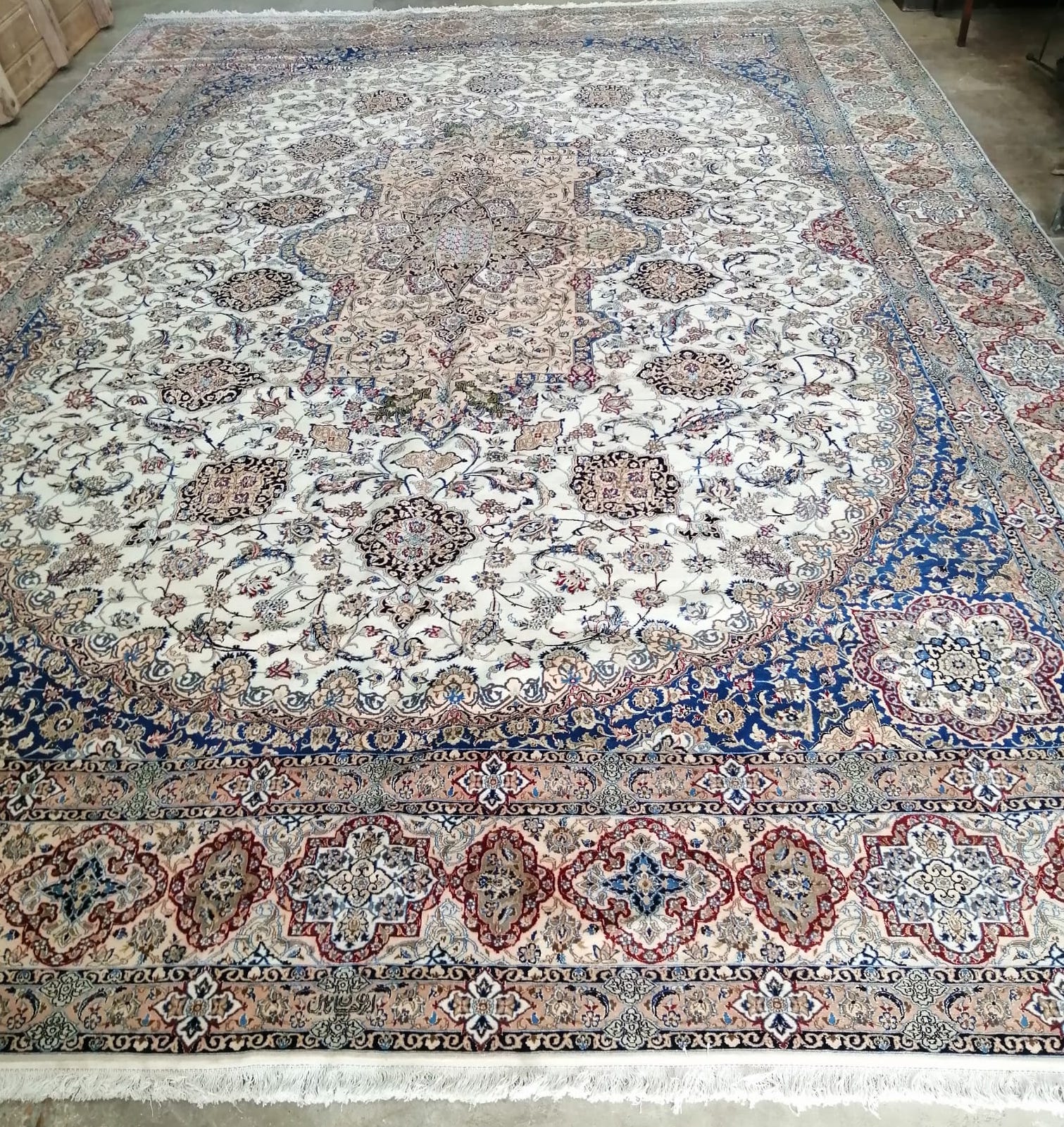 A Tabriz pink ground carpet, 510 x 355cm